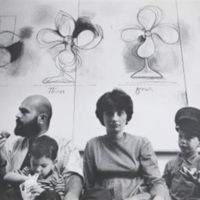 “The Plant Becomes a Fan” in background of photograph, by Ugo Mulas, of Dine with his family. 