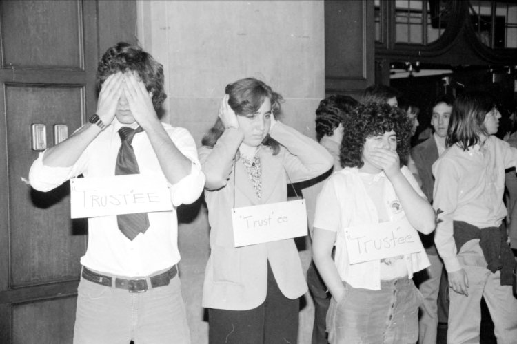 Apartheid : Protests Against : University of Michigan Students Demonstrating Against Apartheid In South Africa-Asking University to Divest of Stock in South Africa, April 19, 1979