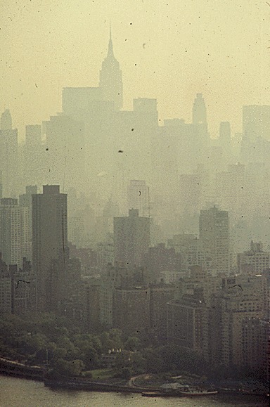 Skyscrapers of Manhattan Veiled in Smog.gif