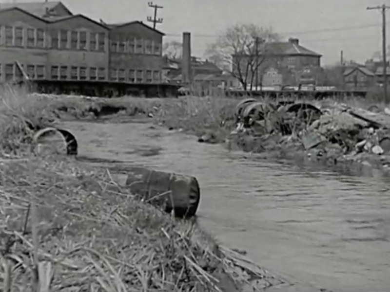 Factory Pollution into River 1930s.png