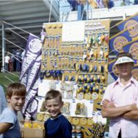 people selling souvenirs at football games.jpg